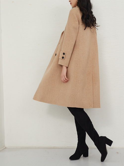 跨界时尚与美妆 探讨鸭宝宝系带双面尼羊绒大衣的进货退货策略